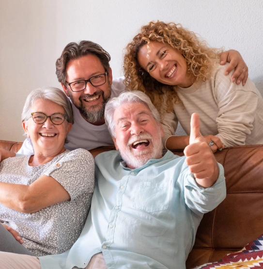 Happy family smiling together after general dentistry care
